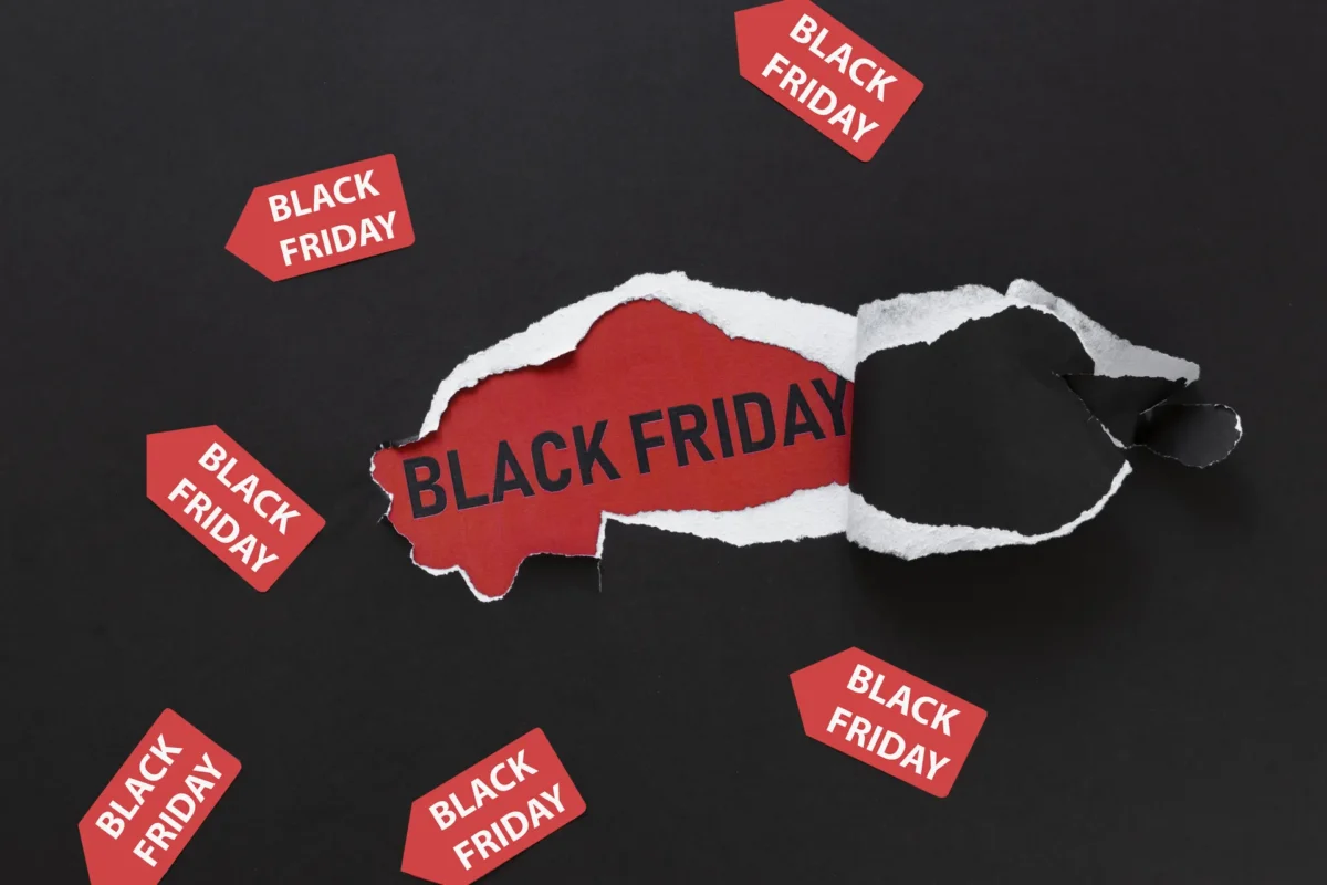 Ripped Paper Revealing Black Friday Text With Stickers